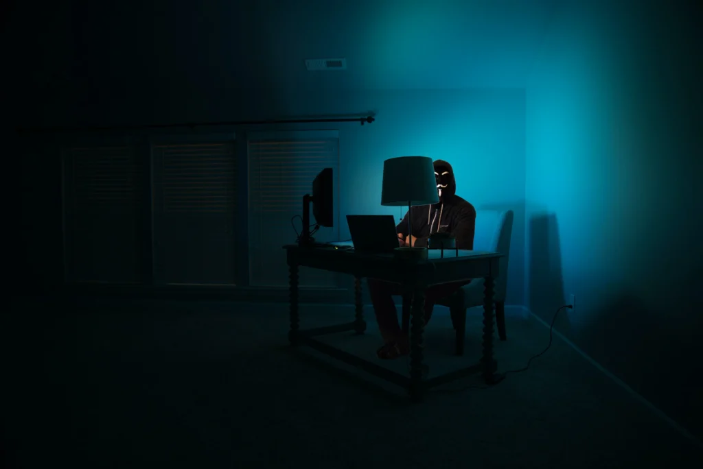 Man Hacking at his computer